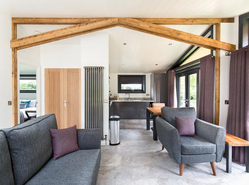 Lounge area showing oak feature beams