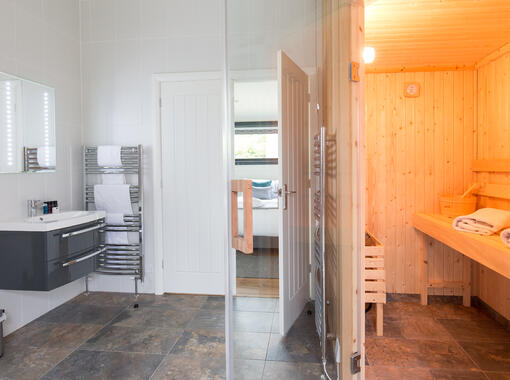 Luxury ensuite bathroom with sauna and shower