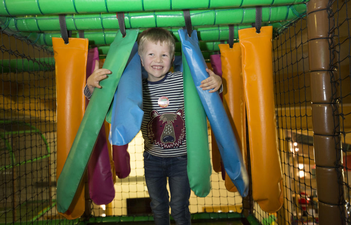 Little boy playing in Little Monkeys