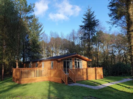 Spinney lodge nestled with in the trees with large verandah