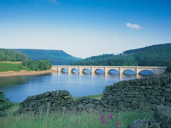 The viaduct bridge at Ladybower reservoirs with beautiful blue sky